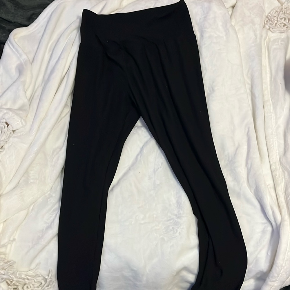 Selling size large leggings with a waist-cross design